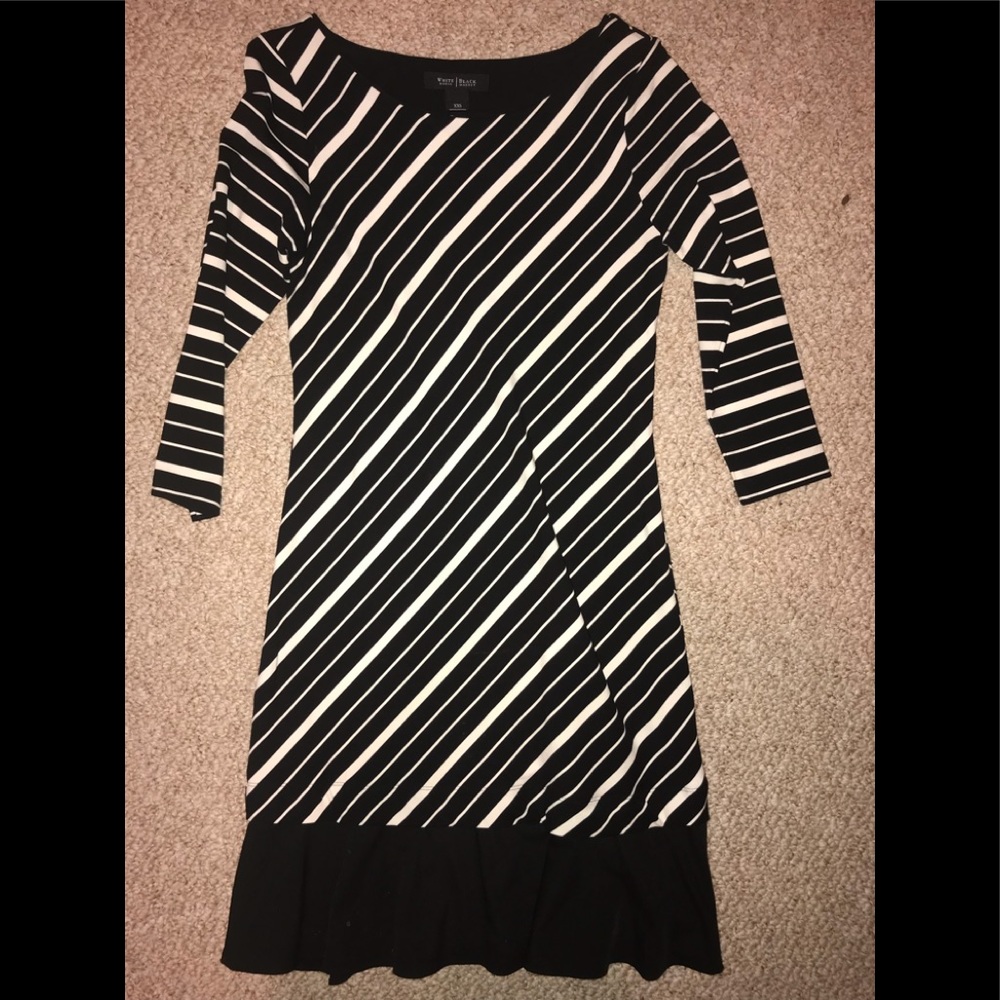Black/white striped dress with ruffle at bottom